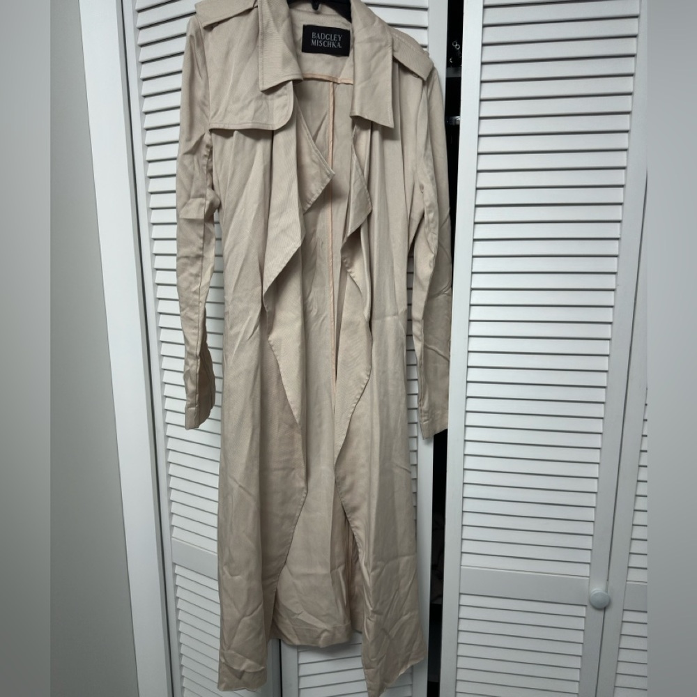 Never worn belted trench coat.